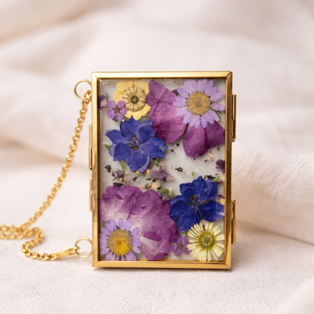 Pressed wedding bouquet flowers preserved in a gold frame by Chantille’s Forever Florals